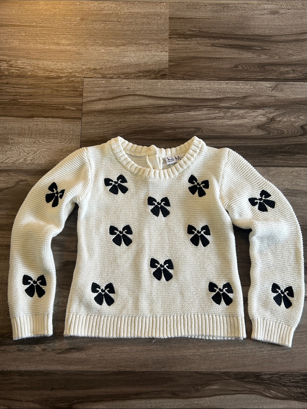 Nicole Miller Cream Crewneck Sweater with Black Bow Accents